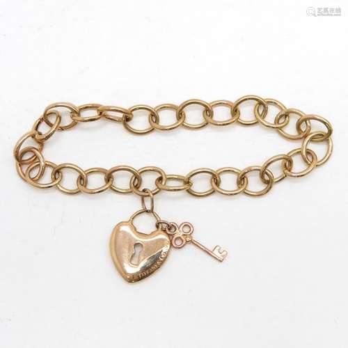 An 18KG Ladies Tiffany Bracelet 28 gram.		An 18KG...