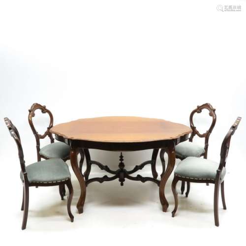 A Biedermeier Table and 4 Chairs Circa 1815 1848....