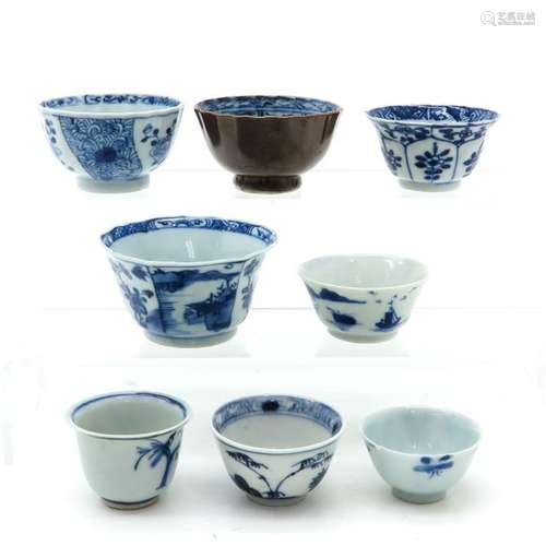 A Diverse Lot of 8 Cups Including blue and white a...