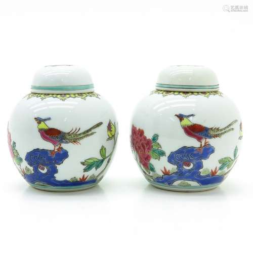 A Pair of Polychrome Ginger Jars with Covers Depic...