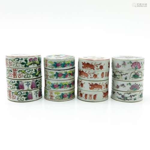 A Set of 4 Polychrome Stacking Boxes In diverse de...