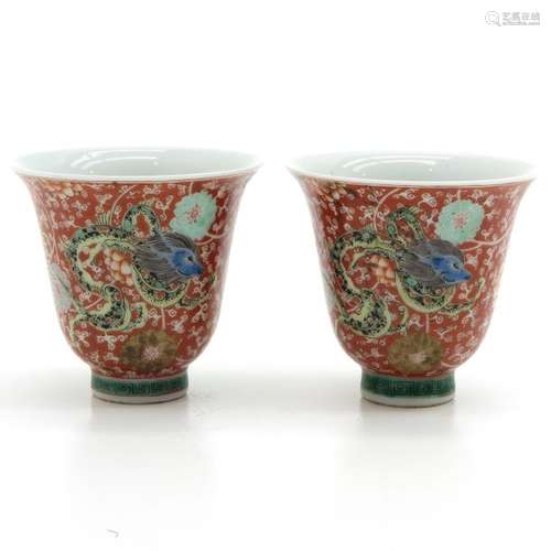 A Pair of 2 Polychrome Decor Cups Depicting green ...