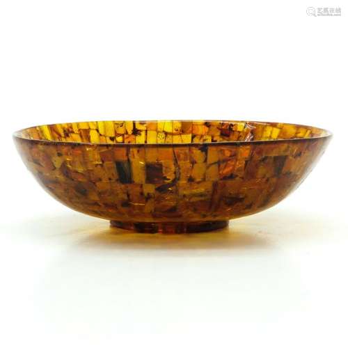 An Amber Bowl 14 cm. In diameter, 84 gram.		An Am...