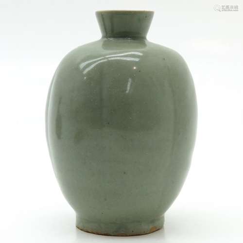 A Light Green Monochrome Vase 22 cm. Tall.		A Lig...