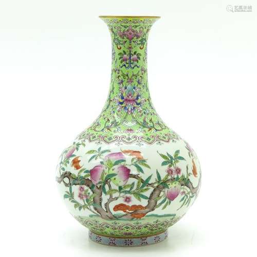 A Famille Rose Vase Depicting flowers and peaches ...