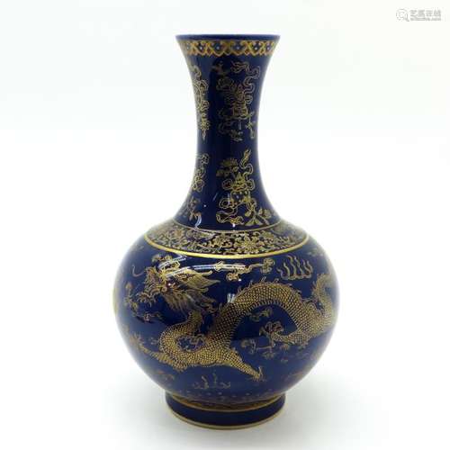 A Blue and Gilt Decor Vase Blue ground with gilt d...