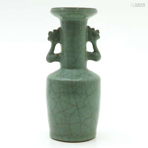 A Celadon Vase 24 cm. Tall.		A Celadon Vase 24 cm...