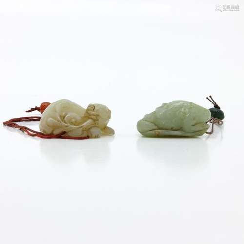 A Pair of Carved Jade Sculptures Depicting a frog ...