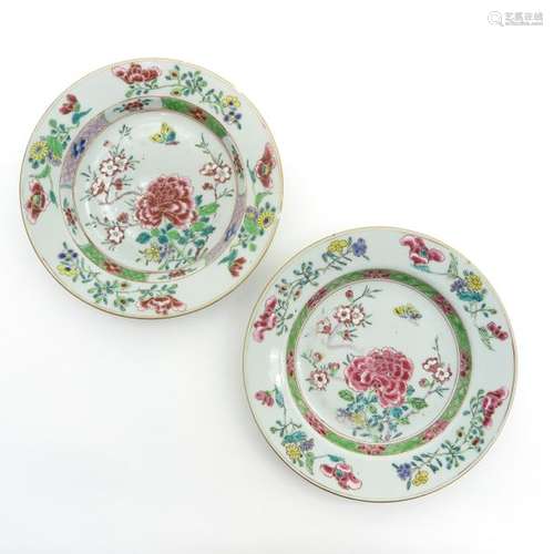 A Pair of Famille Rose Plates Floral decor with bu...