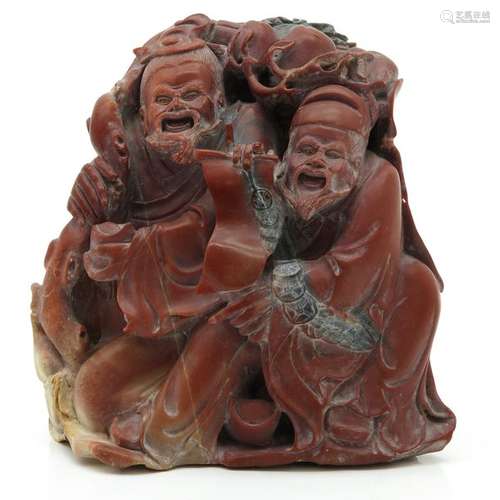 A Carved Stone Sculpture Depicting Chinese men hol...