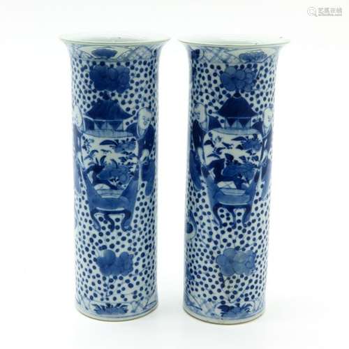 A Pair of Blue and White Vases Depicting Chinese m...