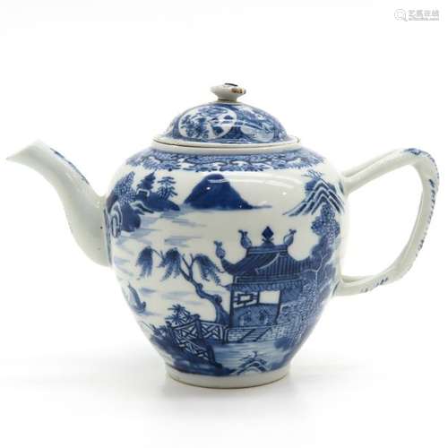 A Blue and White Teapot Landscape decor with pagod...