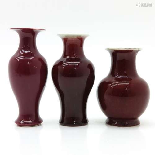 A Lot of 3 Red Monochrome Vases Tallest is 20 cm.,...