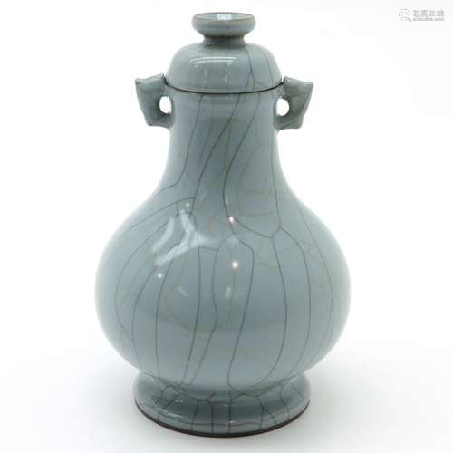 A Celadon Lidded Vase Crackleware background, 21 c...