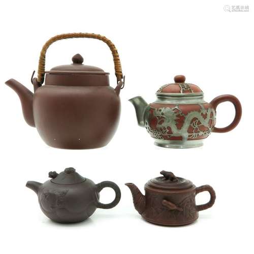 A Lot of 4 Yixing Teapots Largest is 14 cm. Tall....