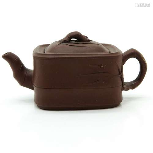 A Yixing Teapot Bamboo decor with bamboo figural h...