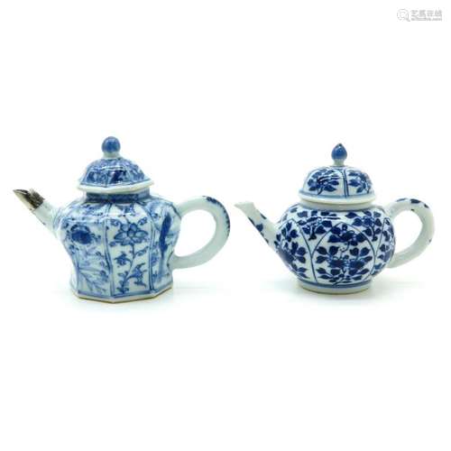 A Lot of 2 Blue and White Teapots Both in floral d...