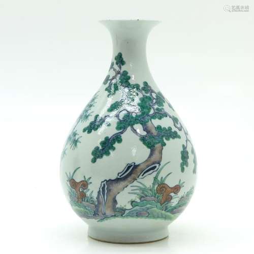 A Polychrome Decor Pear Shaped Vase Depicting tree...