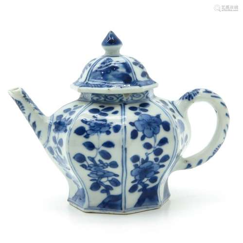 A Blue and White Teapot Floral decor, 11 cm. Tall,...