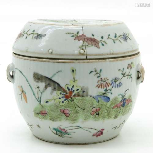 A Polychrome Decor Jar with Cover Depicting flower...