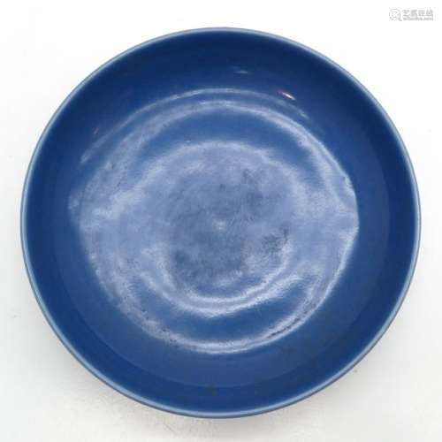 A Monochrome Blue Plate 27 cm. In diameter, scratc...