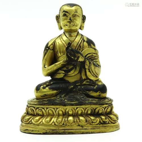 A Bronze Buddha Sculpture Depicting seated Buddha,...