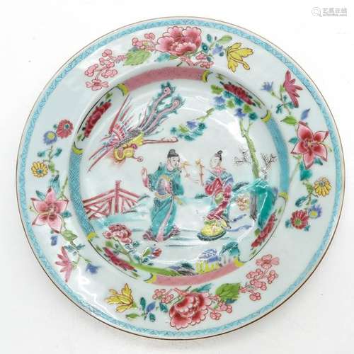 A Famille Rose Plate Depicting Chinese men in gard...