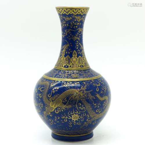 A Blue and Gilt Decor Vase Blue ground with gilt d...