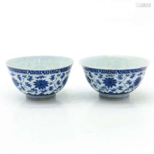 A Pair of Blue and White Bowls Floral decor, marke...