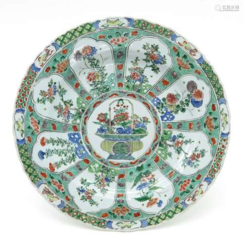 A Famille Verte Charger Fully decorated depicting ...