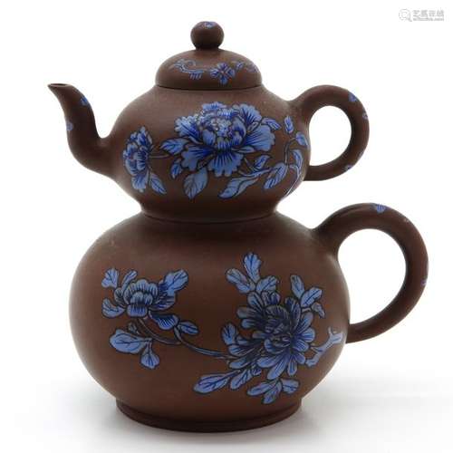 A Yixing Teapot with Blue Enamels Depicting flower...