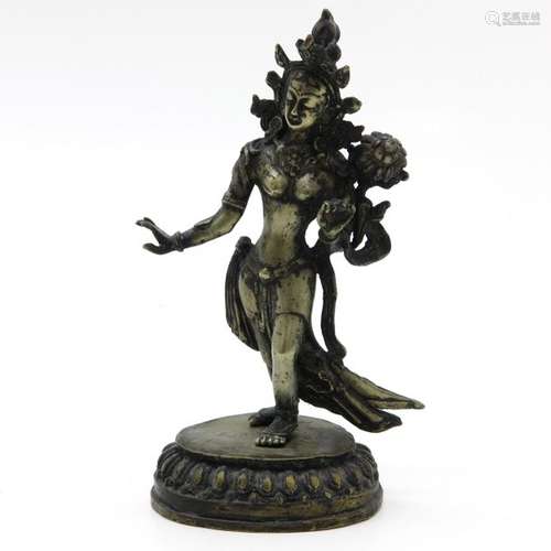 A Bronze Sculpture Depicting Quanyin with flowers,...