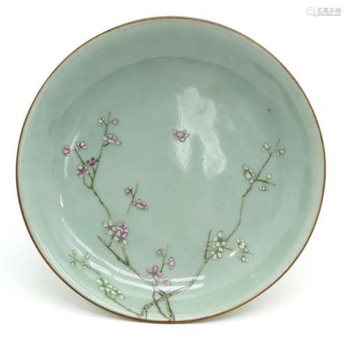 A Celadon Plate with Famille Rose Enamels Depictin...