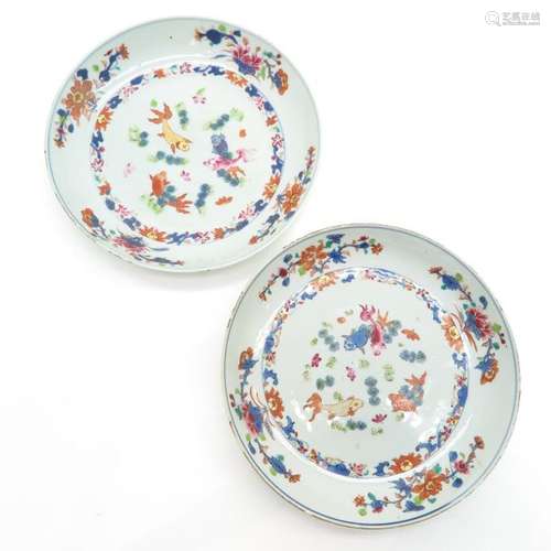 A Pair of Polychrome Decor Plates Depicting fish i...