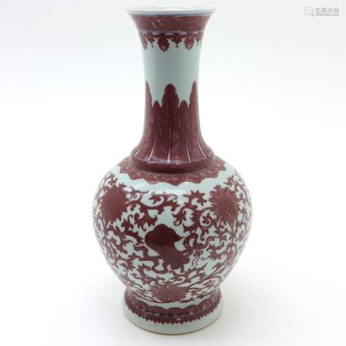 A Red Decor Vase Depicting flowers, marked on bott...