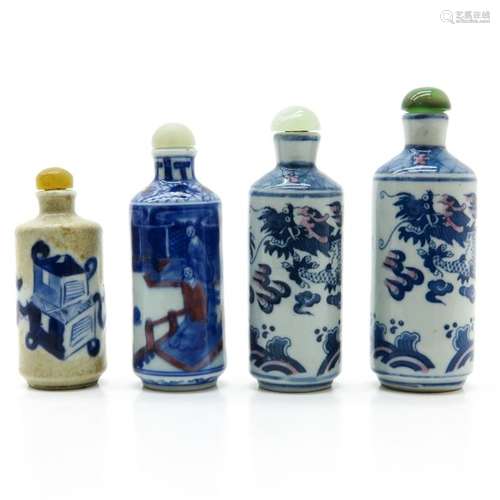 A Lot of 4 Snuff Bottles In diverse decors and siz...