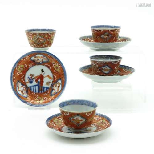 A Set of 4 Cups and Saucers Orange and gold decor,...