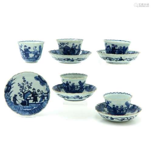 A Series of 5 Blue and White Cups and Saucers Depi...