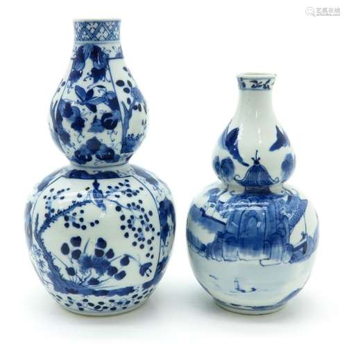 A Lot of 2 Blue and White Gourd Vases Tallest is 2...