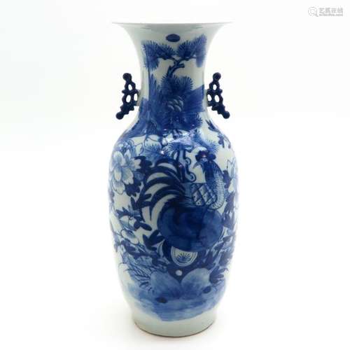 A Blue and White Vase Depicting birds and flowers,...