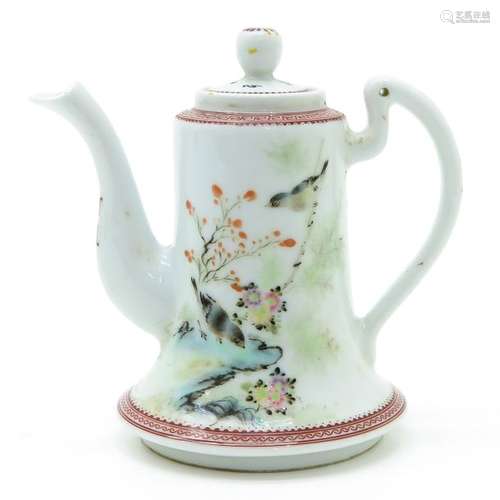 A Polychrome Decor Teapot Depicting flowers and bi...