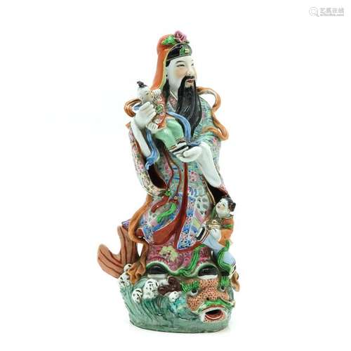 A Porcelain Chinese Immortal Sculpture Shown with ...