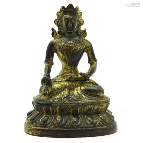 A Bronze Buddha Sculpture Depicting seated Buddha,...