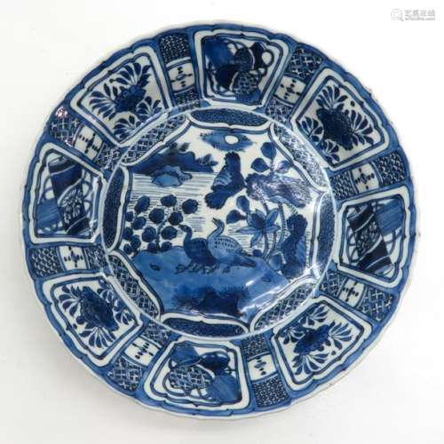 A Blue and White Wanli Plate Depicting birds with ...
