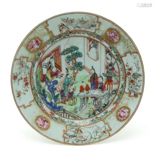 A Polychrome and Gilt Decor Plate Depicting gather...