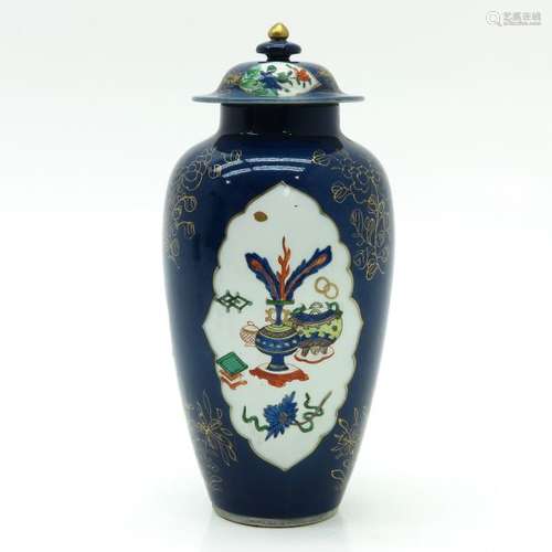 A Powder Blue Vase with Cover Powder blue ground w...