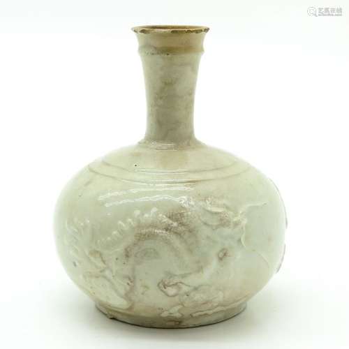 A White Glaze Dragon Vase Raised dragon and cloud ...