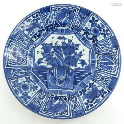 A Blue and White Decorated Arita Charger Floral de...