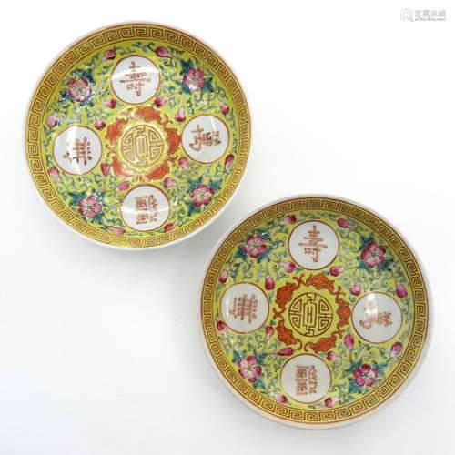 A Pair of Polychrome Decor Plates Yellow ground wi...