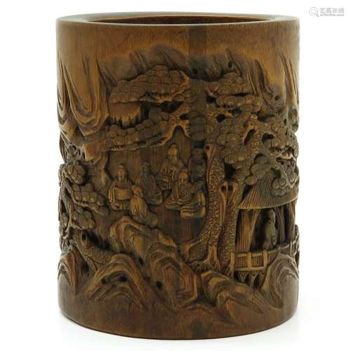 A Carved Wood Brush Pot Depicting Chinese people g...